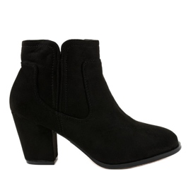 Black insulated boots on the A8123 post