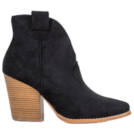 Suede Cowboy Boots On The Pillar black