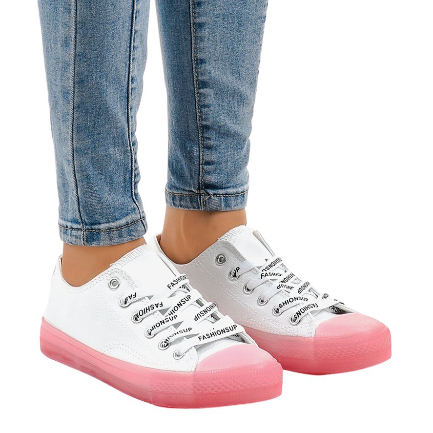 white sneakers with pink soles