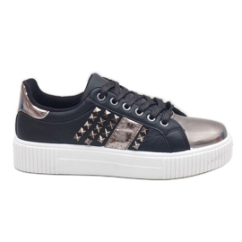 Black sneakers richly decorated with R213 studs Black sneakers richly decorated with R213 studs
