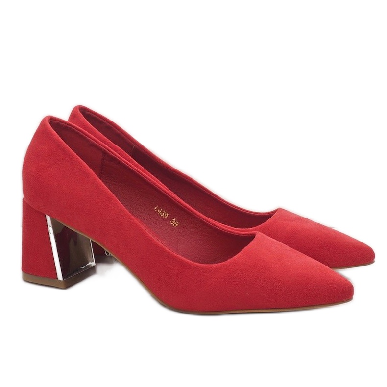 Red suede pumps on the L439 pillar