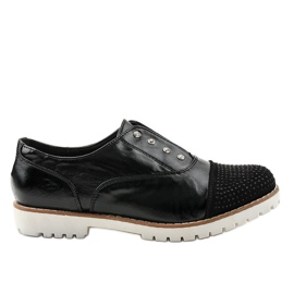 Black slip-on shoes with GF-FD9 studs