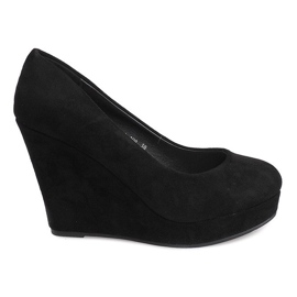 Black suede pumps on the LEI-108 wedge