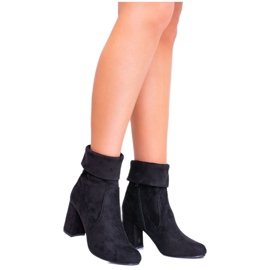 EVE Women's Black Suede Booties on a Darma post