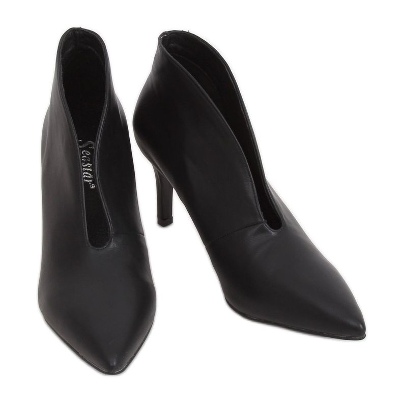 Black shoes on a black NS126P Black pin