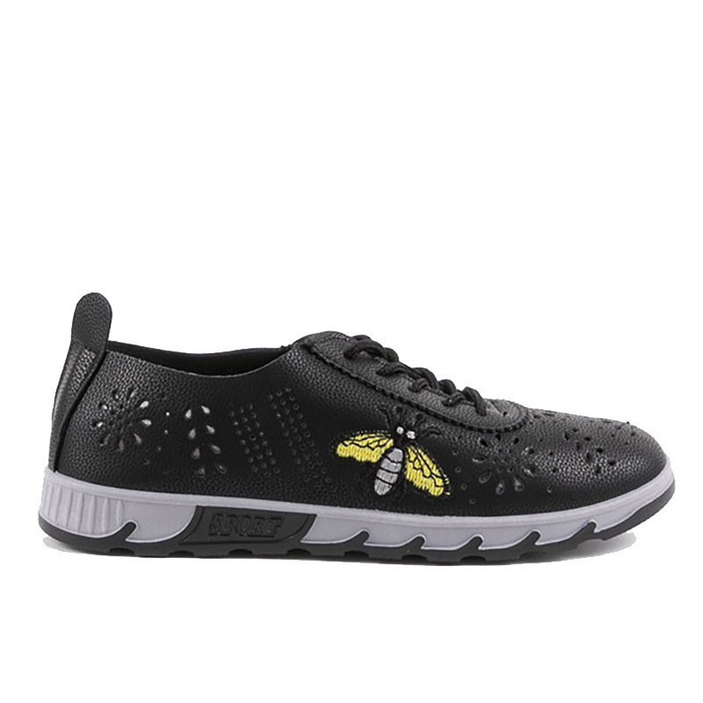 Black openwork sneakers with an imprint of JH81171-3