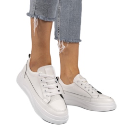 White sneakers on a higher R50 sole black White sneakers on a higher R50 sole black