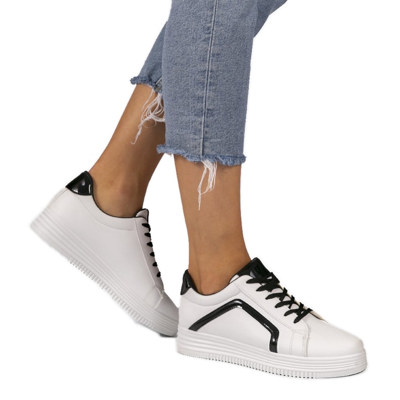 White fashionable sport sneakers made of eco-leather S022 black