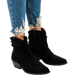 Black suede high cowboy boots from Euphelea