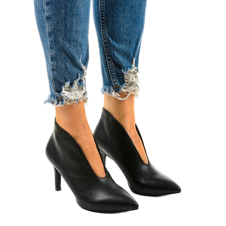 Black slip-on boots with cutouts on the NS126P Pu stiletto heel
