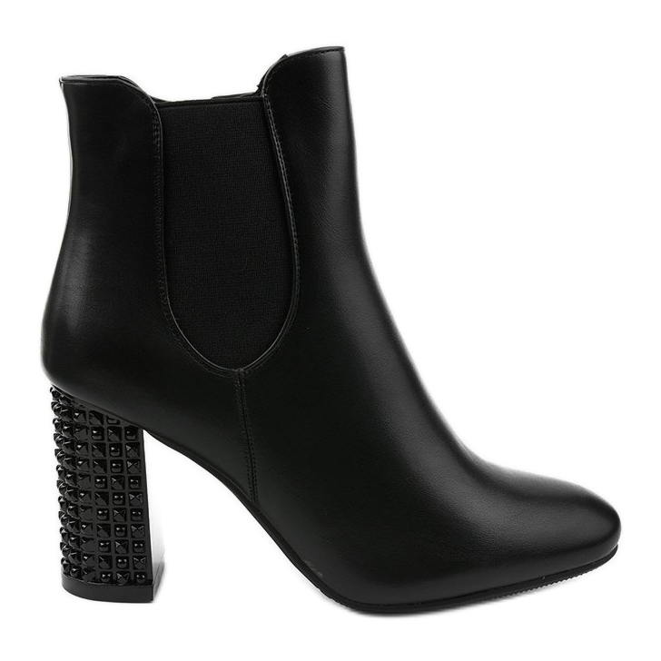 Black ankle boots on the Chardonnay post