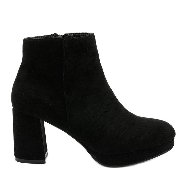 Black suede ankle boots on the Mahoganis post