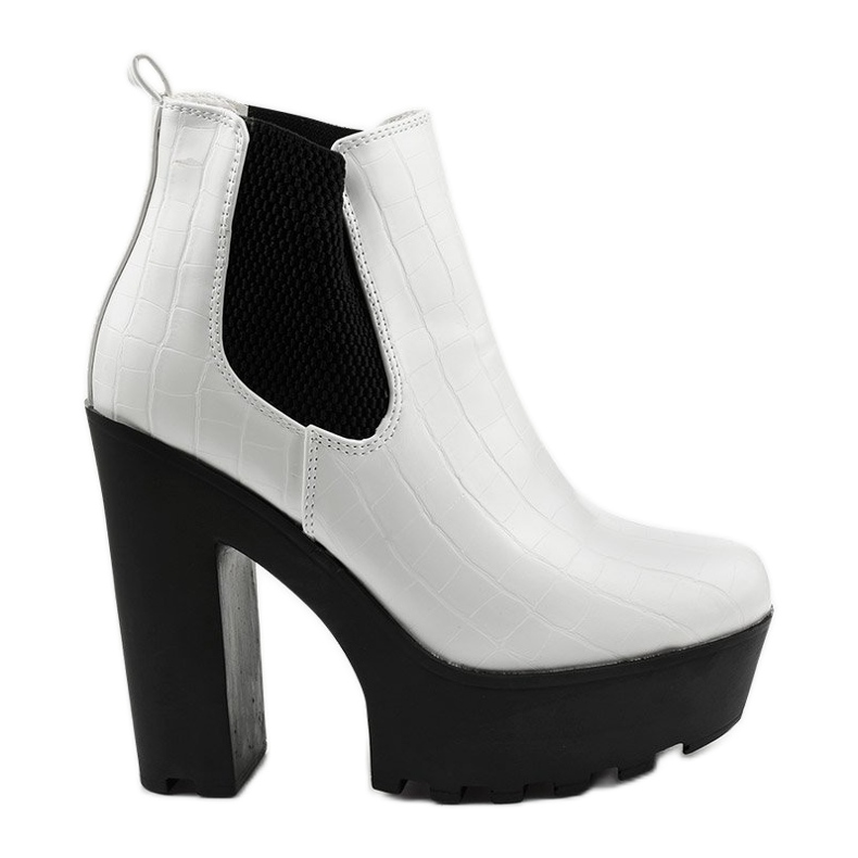 White ankle boots on the Zellola post