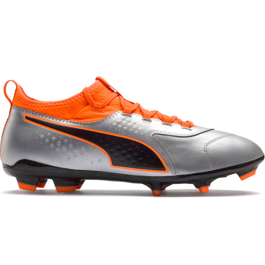gray and orange soccer cleats