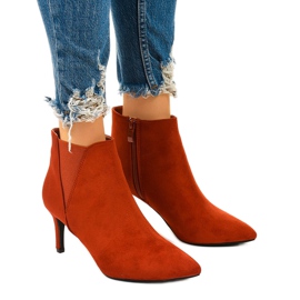 Red ankle boots with a Pattera elastic band
