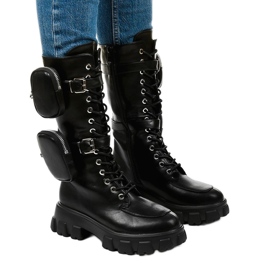 Black boots on a massive Speculation sole