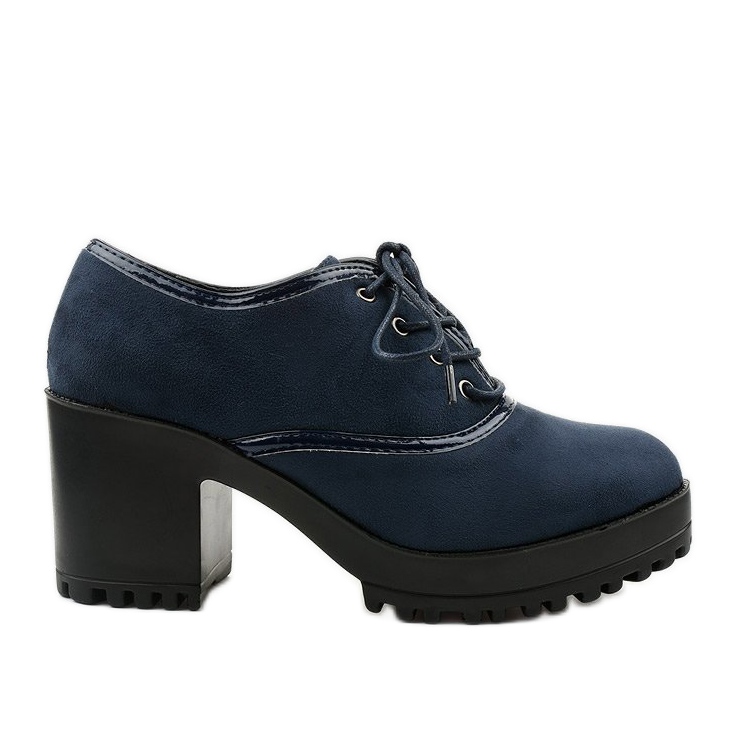 Navy blue ankle boots laced on a Clearfall block