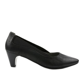 Ladies' black pumps on the Deloney post
