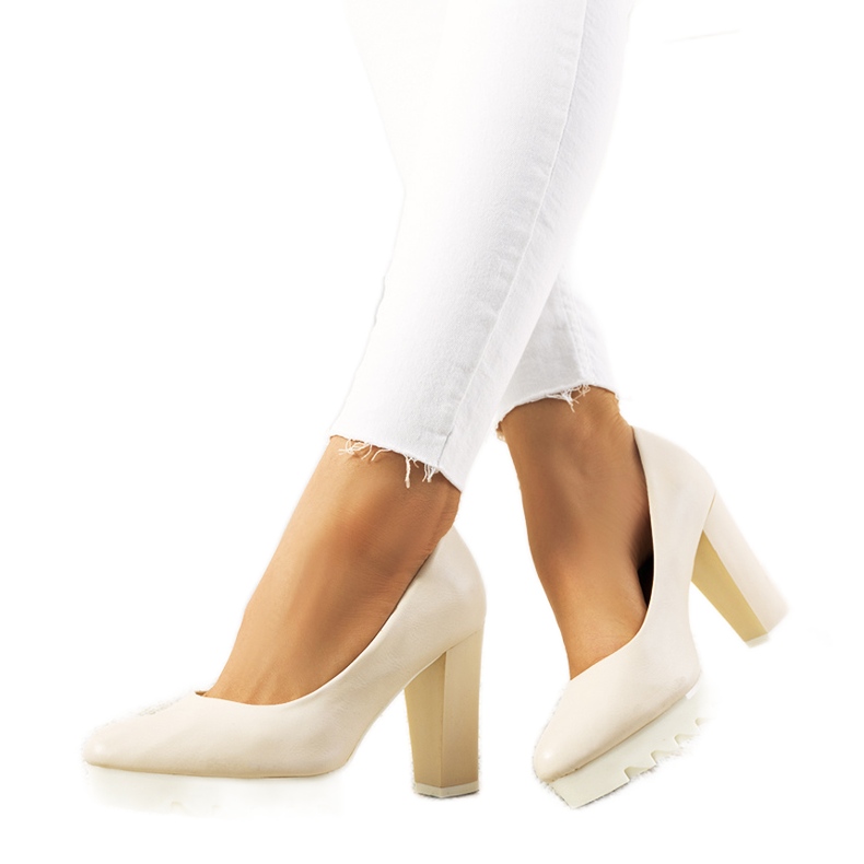 Beige pumps on the Silverbee post