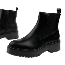 Black flat boots in Cavern eco-leather