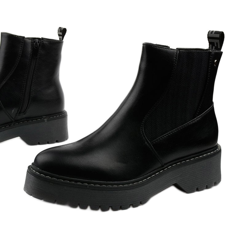 Black flat boots in Cavern eco-leather