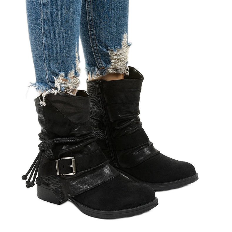 Black ankle boots with a buckle and decorative Coord upper