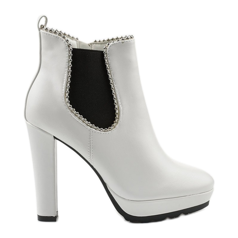 White ankle boots with a zipper and Circus elastic