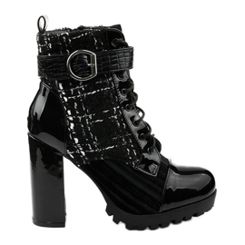 Black patchwork boots from Feramo Black patchwork boots from Feramo