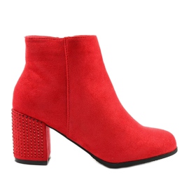 Red glitter ankle boots on the Slatemark post
