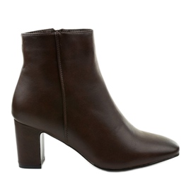 Brown eco-leather ankle boots on the Nilandaley post