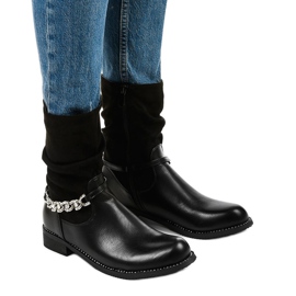 Black, flat, insulated boots with a Petgella zipper silver