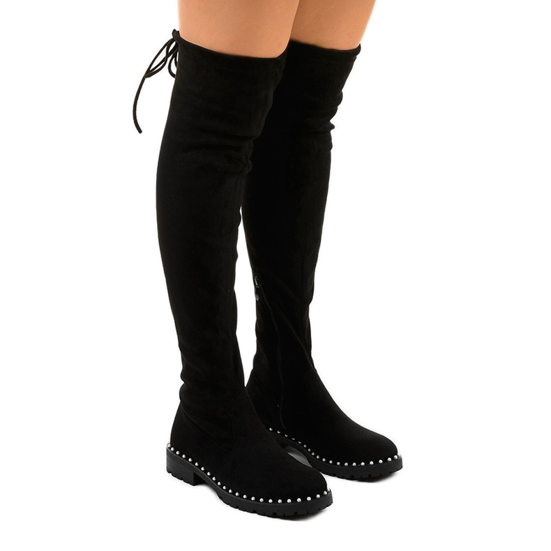 Black flat boots with a long Cozysand shank