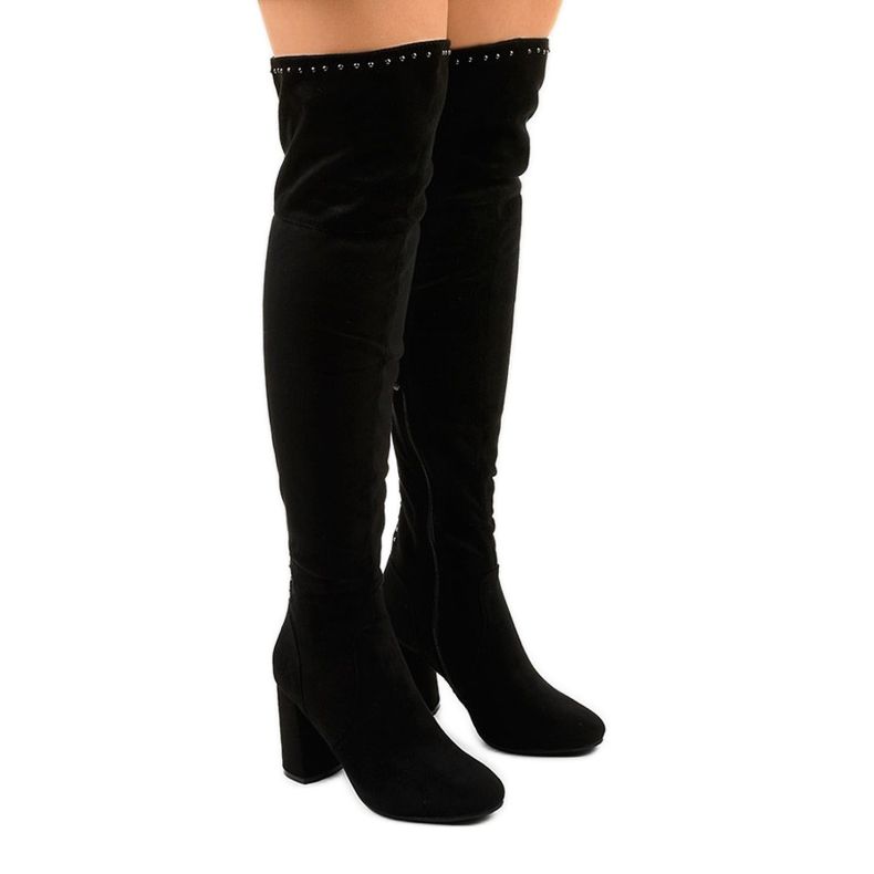 Black, insulated boots with an Infrared jets upper