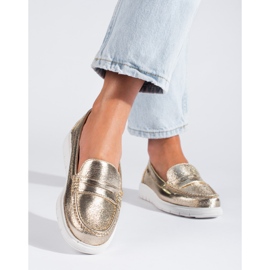 Gold moccasins on a thick Shelovet platform golden 1