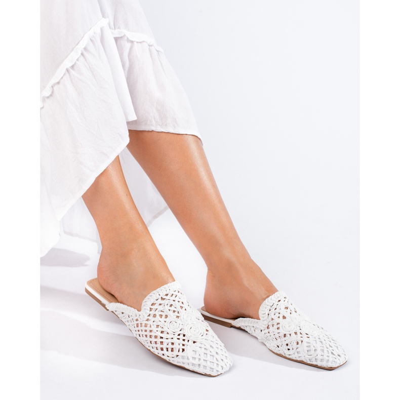 White flat sandals with an openwork upper from Shelovet 2