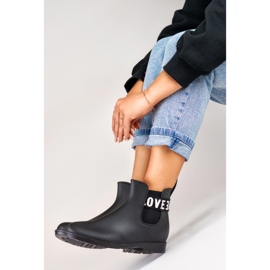 Love White women's matte black rain boots 1