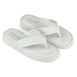 Women's flip-flops on the white platform 1
