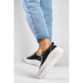 Black sneakers on a low platform 2