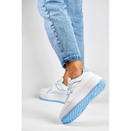 Women's white sneakers with blue accessories 2