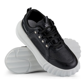 Black women's sports shoes with a white sole 1