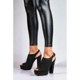 Black high heel sandals with open toe and heel 1