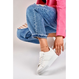 Women's white sneakers on the platform 1