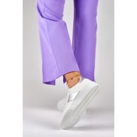 Women's white sneakers on the platform with a silver addition 1