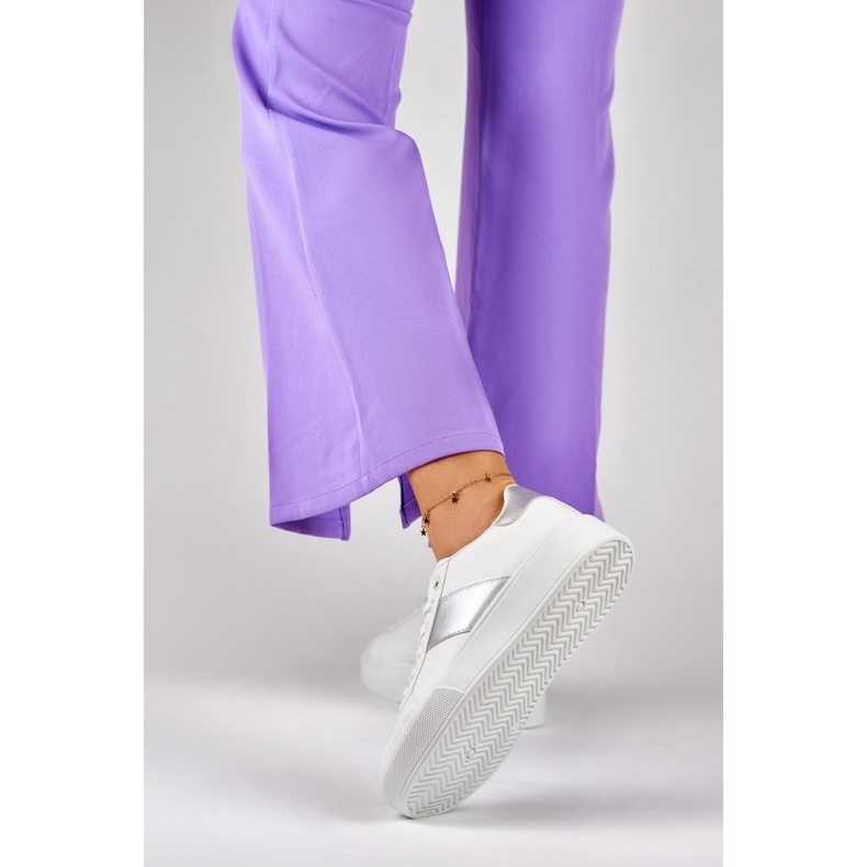 Women's white sneakers on the platform with a silver addition 1