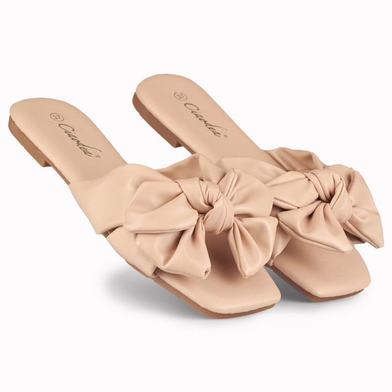 Beige bow sliders from Isanna 1