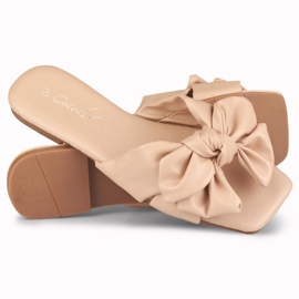 Beige bow sliders from Isanna 2