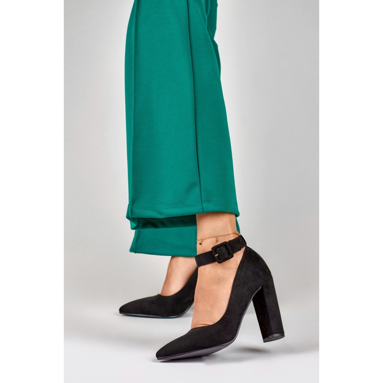 Ladies' black pumps fastened at the ankle 1