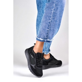 Black women's sports shoes with a black sole 2 Black women's sports shoes with a black sole 2