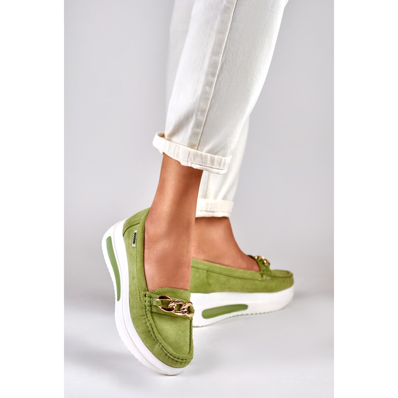 Light green women's loafers on the platform 1