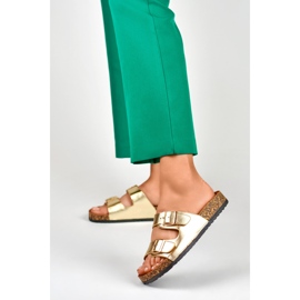 Gold flip flops on a cork sole golden 2